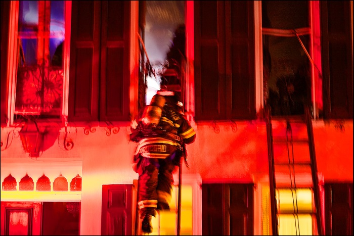 Firefighters respond to a home fire at 18 Elliott Street in downtown Charleston, SC.